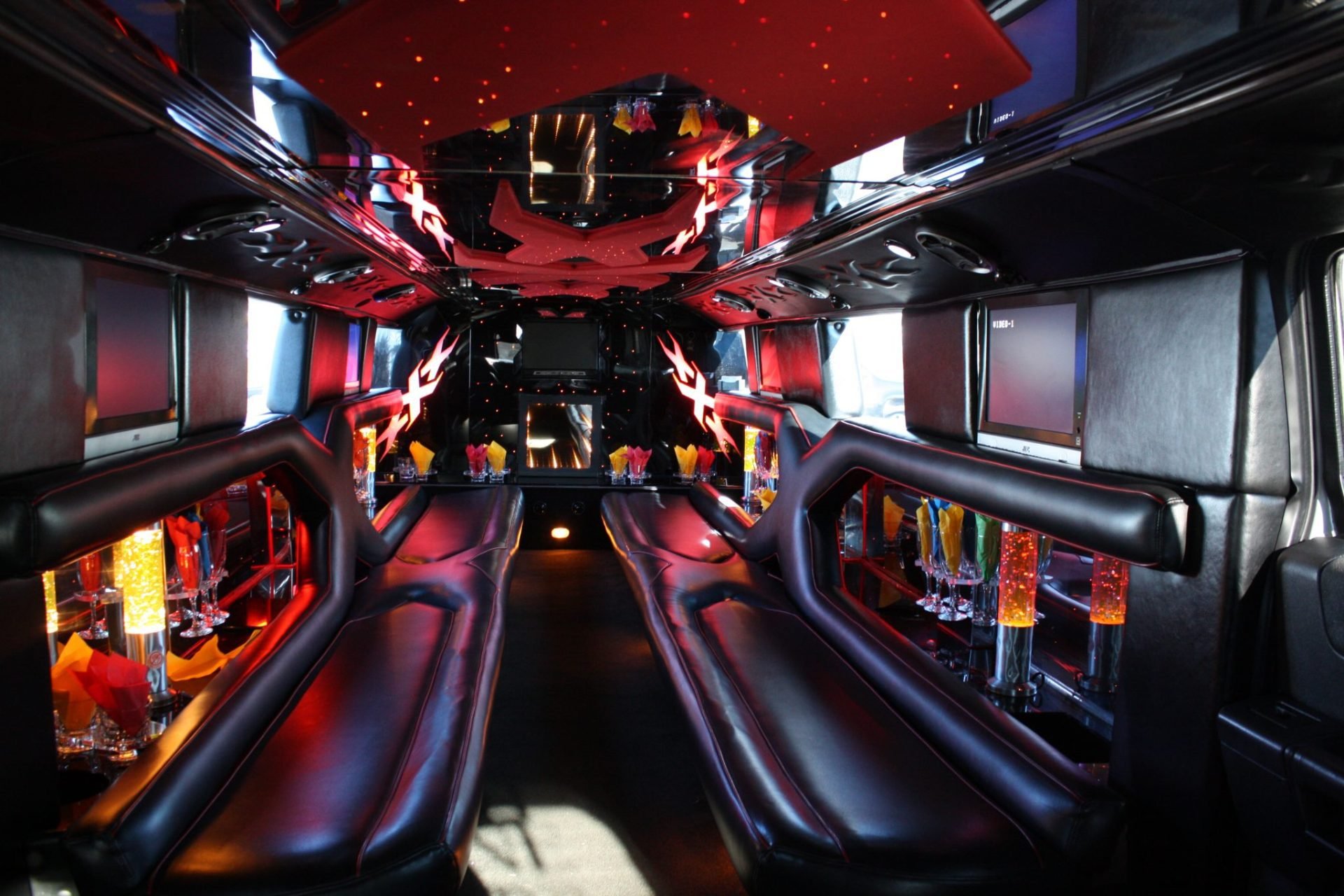 Black Hummer H2 stretch limousine interior with LED lighting and bar — Ballantyne Limousine, Charlotte NC