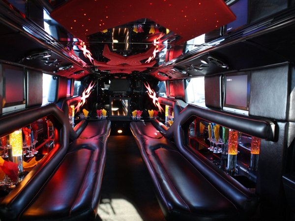 Black Hummer H2 stretch limousine interior with LED lighting and bar — Ballantyne Limousine, Charlotte NC