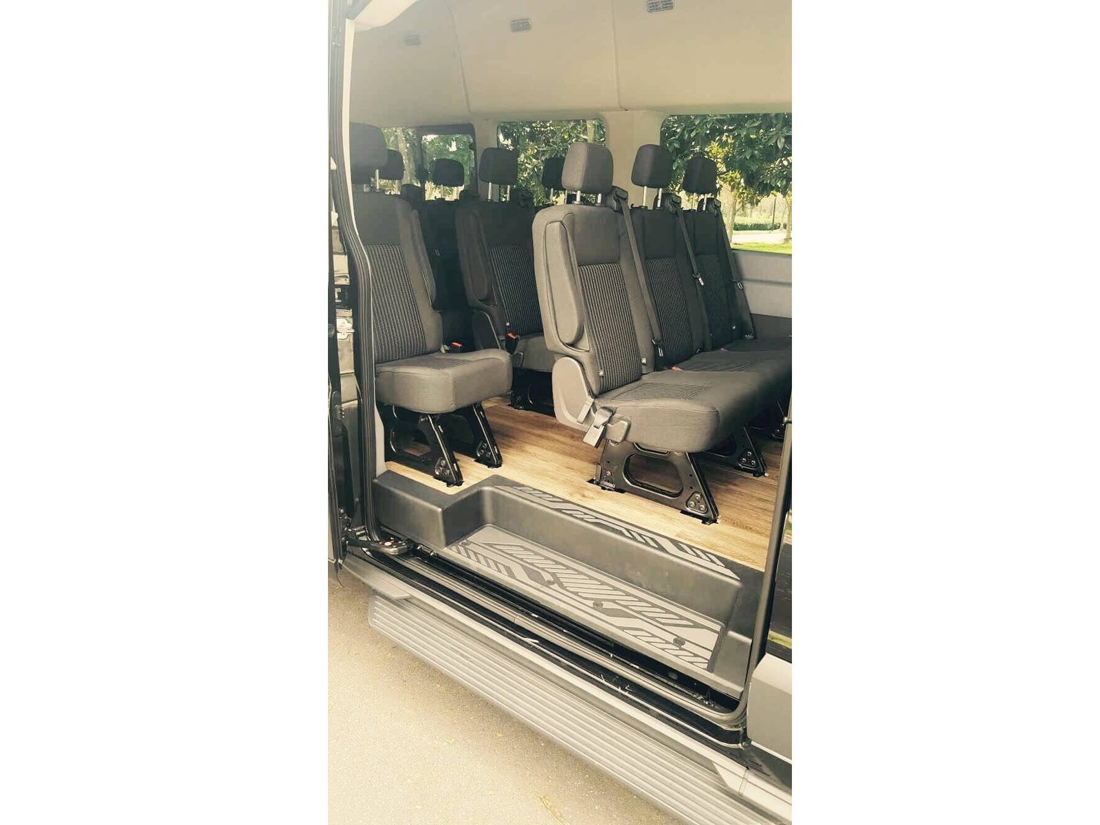 Luxury Van passenger seating through the open side door — Ballantyne Limousine, Charlotte NC